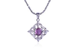 A PINK SAPPHIRE AND DIAMOND PENDANT ON A CHAIN