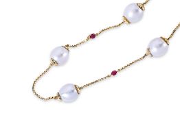 A CULTURED SOUTH SEA PEARL NECKLACE WITH RUBY SPACINGS