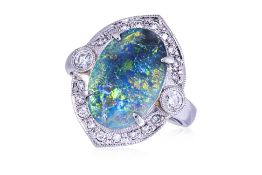 A BLACK OPAL AND DIAMOND RING
