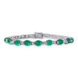 AN EMERALD AND DIAMOND BRACELET