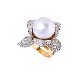 A CULTURED BAROQUE PEARL AND DIAMOND 'ORCHID' RING