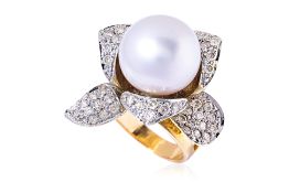 A CULTURED BAROQUE PEARL AND DIAMOND 'ORCHID' RING