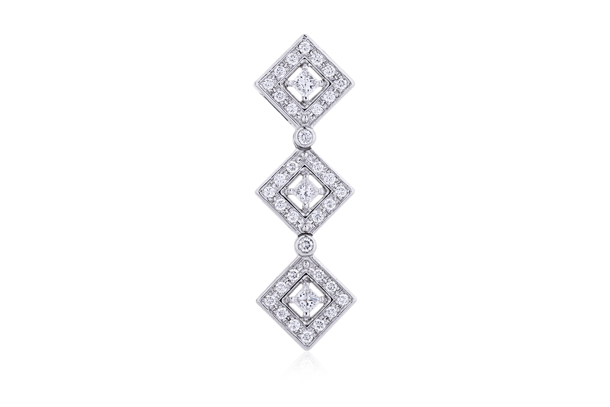 A DIAMOND HINGED PENDANT BY TASAKI