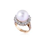 A CULTURED PEARL AND DIAMOND RING