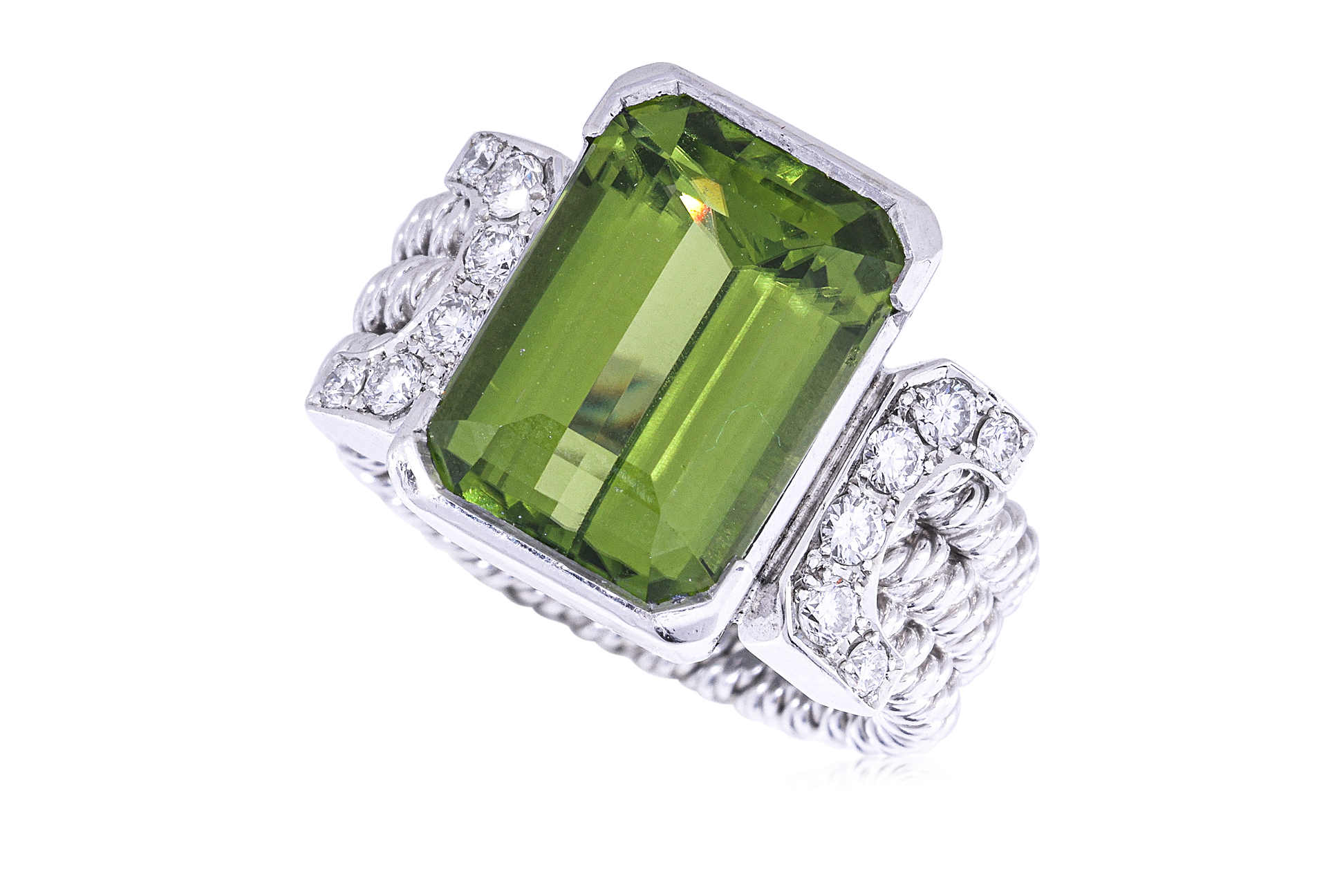 A PERIDOT AND DIAMOND RING BY KOJI IWAKURA