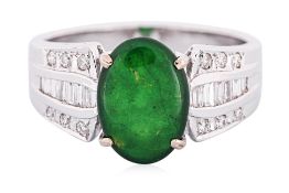 A JADE DOUBLET AND DIAMOND RING