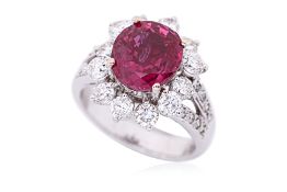 A FINE UNHEATED BURMESE RUBY AND DIAMOND CLUSTER RING