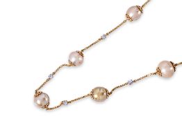 A CULTURED SOUTH SEA PEARL NECKLACE WITH SAPPHIRE SPACINGS