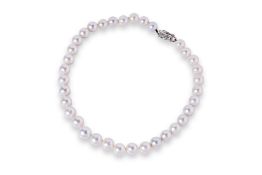 A CULTURED PEARL STRAND WITH A DIAMOND CLASP