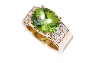 A PERIDOT AND DIAMOND RING BY TASAKI