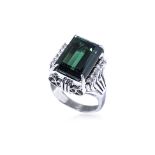 A GREEN TOURMALINE AND DIAMOND RING