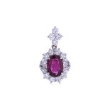 A RUBY AND DIAMOND CLUSTER PENDANT