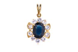 A BLUE AND WHITE SAPPHIRE GOLD PENDANT