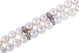 A CULTURED PEARL DOUBLE STRAND BRACELET WITH DIAMOND SPACERS