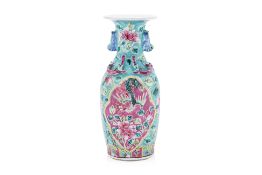 A SMALL TURQUOISE GROUND FAMILLE ROSE PORCELAIN VASE