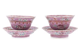 A PAIR OF PINK GROUND 'BUTTERFLY' TEA BOWLS AND SAUCERS