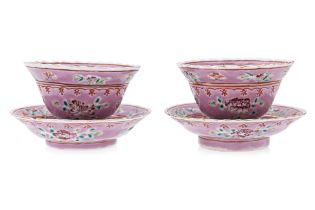 A PAIR OF PINK GROUND 'BUTTERFLY' TEA BOWLS AND SAUCERS