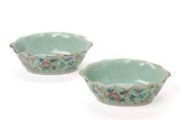 A PAIR OF OVAL CELADON GROUND FAMILLE ROSE OFFERING BOWLS