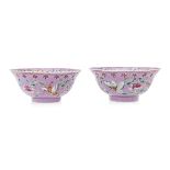 A PAIR OF PINK GROUND FAMILLE ROSE 'BUTTERFLY' BOWLS