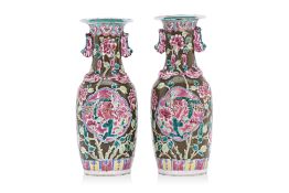 A PAIR OF OLIVE GREEN FAMILLE ROSE VASES