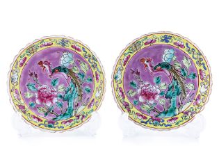 A PAIR OF PINK GROUND FAMILLE ROSE SAUCERS