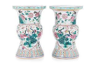 A PAIR OF FAMILLE ROSE 'PEACOCK' SPITTOONS