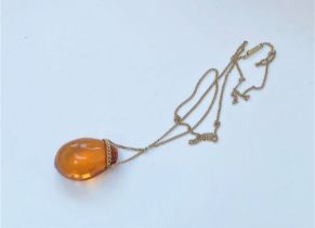 Antique 15ct gold amber necklace with pin and barrel clasp.