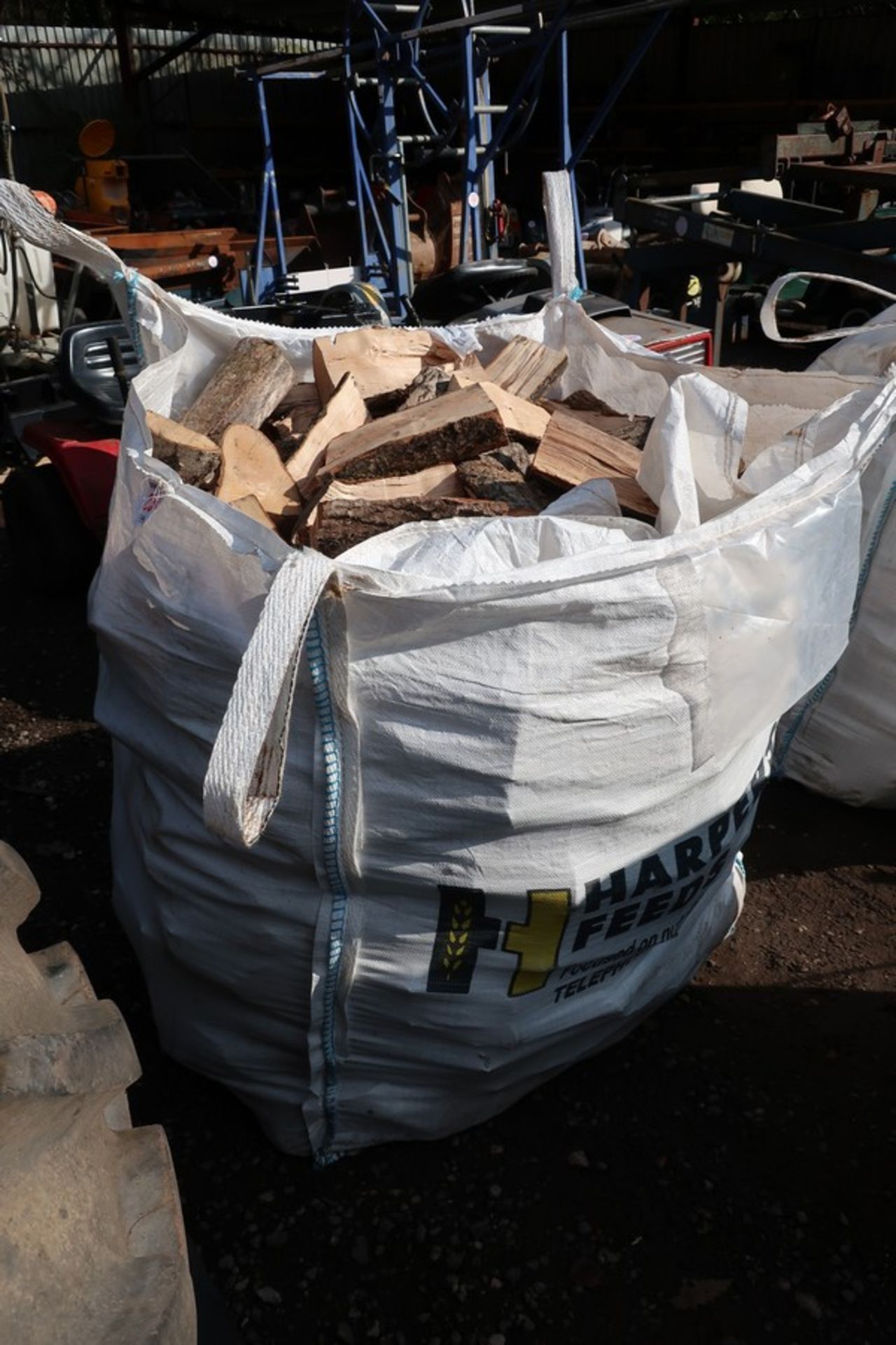 DUMPY BAG OF HARD WOOD LOGS