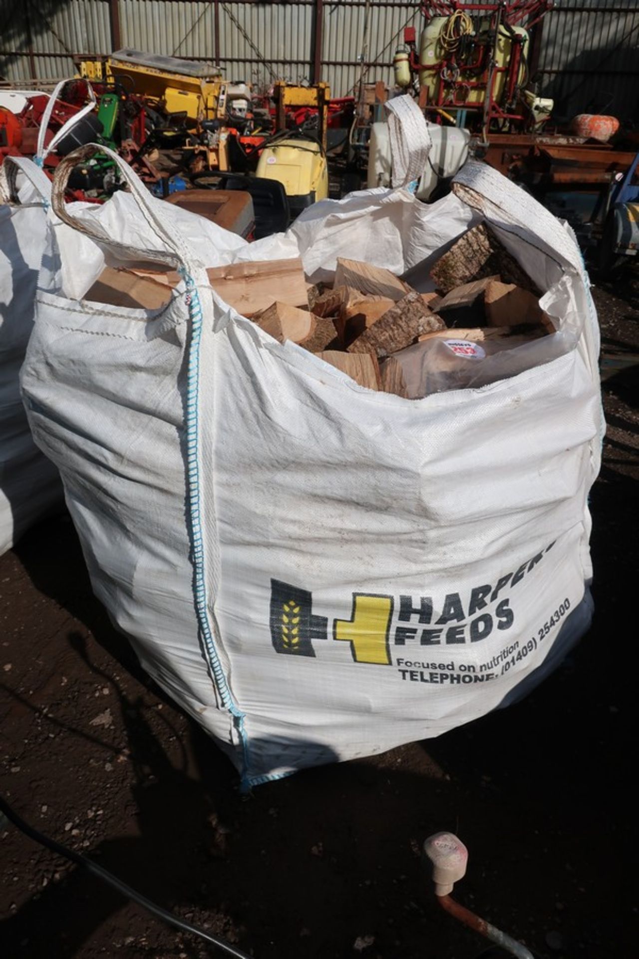 DUMPY BAG OF HARD WOOD LOGS