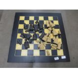 A chess board and pieces **PLEASE NOTE THIS LOT IS NOT ELIGIBLE FOR POSTING AND PACKING**