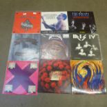 Eleven vinyl LP records and five 12" singles, rock including Motorhead, Rolling Band, Police, Bon