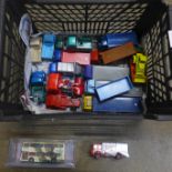 Die-cast model vehicles including Dinky Supertoys lorries and flat-bed trucks, some re-painted