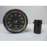 A WWII Spitfire starter button (part 5C898) and a vehicle dial by Crypton