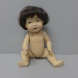 A doll, marked JDK, 243, 26cm