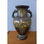 A Champleve enamelled bronze double handled vase