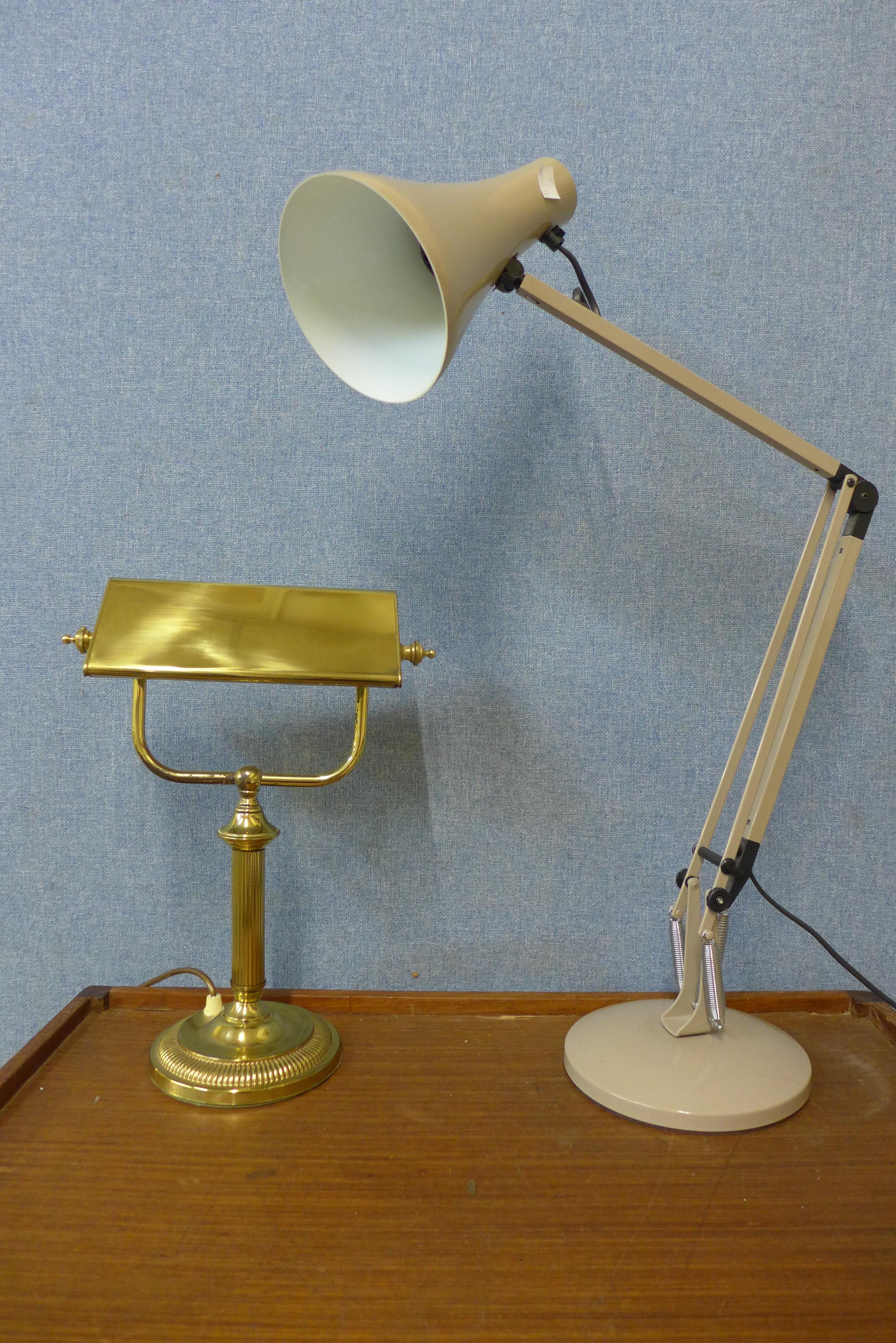 A taupe metal anglepoise desk lamp and a brass student's desk lamp