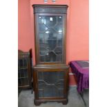 An Edward VII Chippendale Revival mahogany freestanding corner cabinet