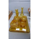 An amber coloured Czech glass dressing table set **PLEASE NOTE THIS LOT IS NOT ELIGIBLE FOR