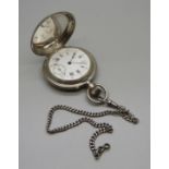 A white metal full hunter pocket watch, with inscription dated 1889, (tests as silver), on a chain