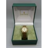 A lady's Gucci wristwatch, boxed, with spare link