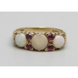 A 9ct gold, opal and ruby set ring, 3.5g, O, centre stone cracked