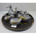 A set of eight graduated duck pots, made in China, and a lacquered tray, tray a/f