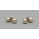 Two pairs of silver mounted cultured pearl earrings