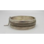 A Victorian bangle, (tests as silver)