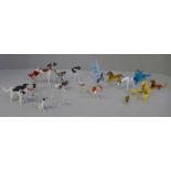 A collection of small glass dog figures