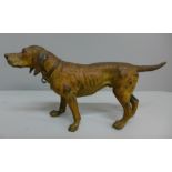 An Austrian early 20th Century cold painted bronze model of a dog, in the manner of Bergman, H13cm x