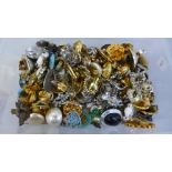 Over fifty pairs of vintage clip-on earrings