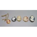 Four cameo pendants and a brooch