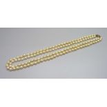 A double row pearl necklace with a 14ct gold Chinese style clasp