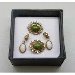 A pair of 9ct gold and opal earrings and a pair of 9ct gold and jade earrings